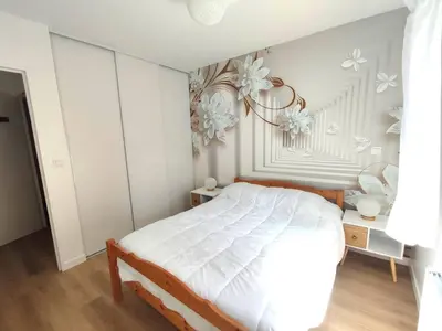 Un ou plusieurs lits dans un hébergement de l'établissement Appartement avec WIFI, terrasse, jardin à TREBEURDEN Réf - 678
