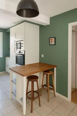 Cuisine ou kitchenette dans l'établissement Appartement spacieux de 92m2
