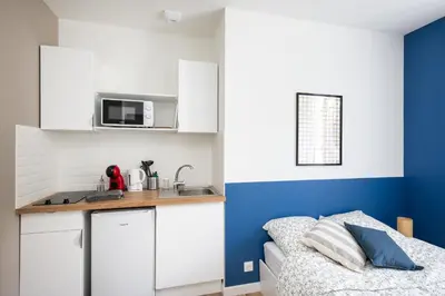 Cuisine ou kitchenette dans l'établissement Ribine