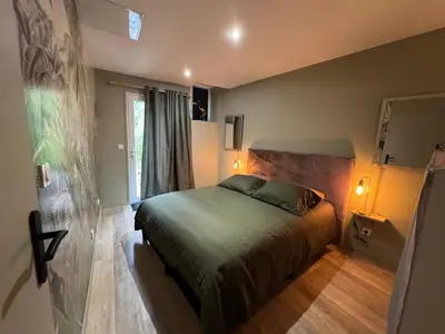 Un ou plusieurs lits dans un hébergement de l'établissement Appartement, terrasse de plain-pied
