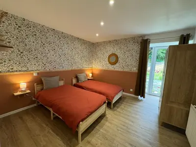 Un ou plusieurs lits dans un hébergement de l'établissement Appartement, terrasse de plain-pied