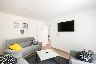 Télévision ou salle de divertissement dans l'établissement Chambre independante Houle