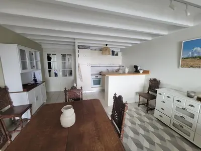 Cuisine ou kitchenette dans l'établissement Duplex Lesconil