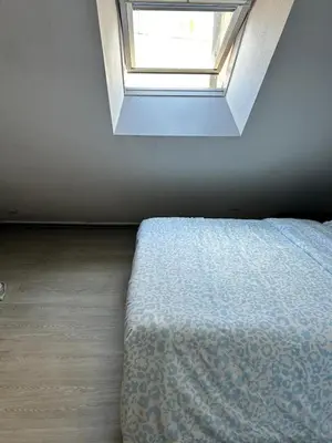 Un ou plusieurs lits dans un hébergement de l'établissement Le Duplex de la Place