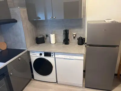 Cuisine ou kitchenette dans l'établissement Appartement Brest proche du centre