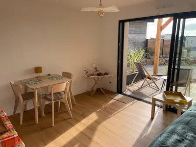 Coin salon dans l'établissement Appartement bord de mer