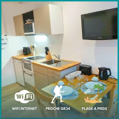 Cuisine ou kitchenette dans l'établissement Ty Angel - wifi - 1er étage