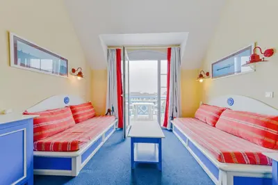 Un ou plusieurs lits dans un hébergement de l'établissement Residence Cap Marine - maeva Home