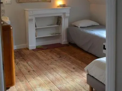 Un ou plusieurs lits dans un hébergement de l'établissement Holiday Home in Locquirec near Sandy Beach