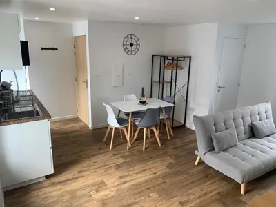 Coin salon dans l'établissement Duplex calme et cosy II