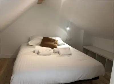 Un ou plusieurs lits dans un hébergement de l'établissement La cabine du bout du monde avec Mezzanine PL04, Tevennec - votre maison de vacances de haut standing