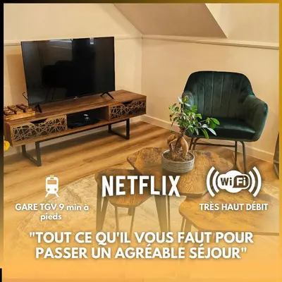 Télévision ou salle de divertissement dans l'établissement Logements neufs à Bannalec Centre