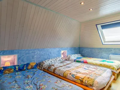 Un ou plusieurs lits dans un hébergement de l'établissement Holiday Home La Glycine by Interhome